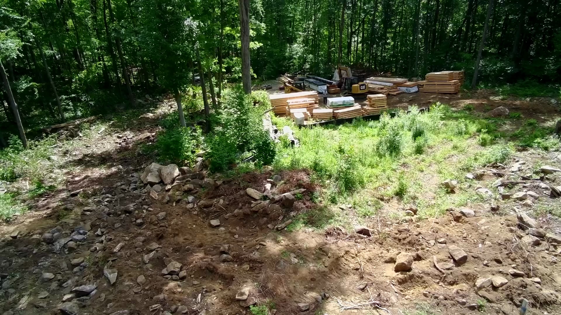 drone view of future driveway approach from the house